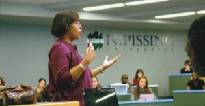 Photo of Dr. Brown teaching in a Nipissing University classroom.